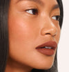 Cathrina wears Fluffmatte in Brunette