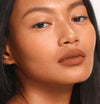 Cathrina wears Fluffmatte in Milk Tea