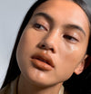 Amanda wears Fluffmatte in Milk Tea