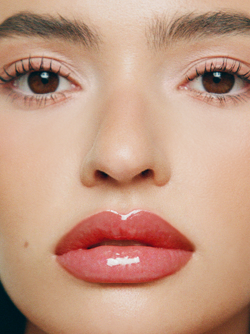 Rocio wears Lip Glaze in Bonbon