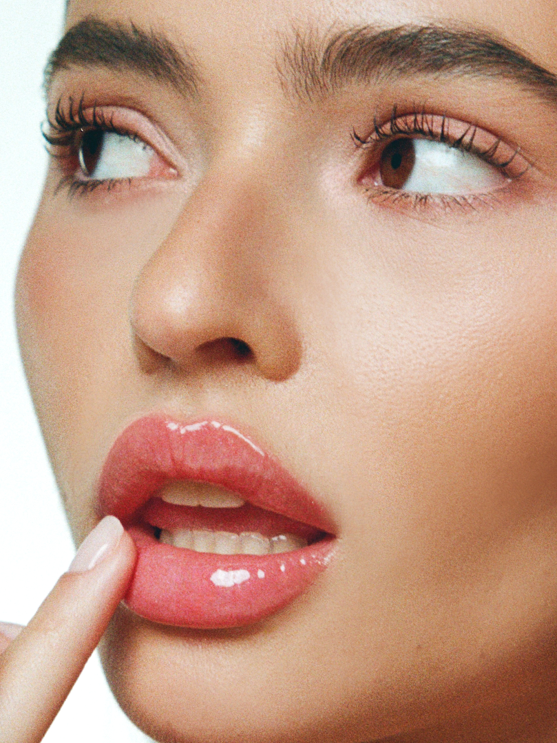 Rocio wears Lip Glaze in Coquette