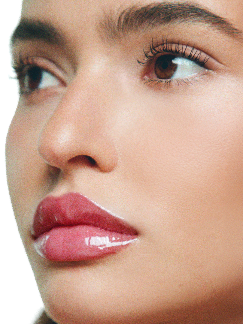 Rocio wears Lip Glaze in Sour Plum